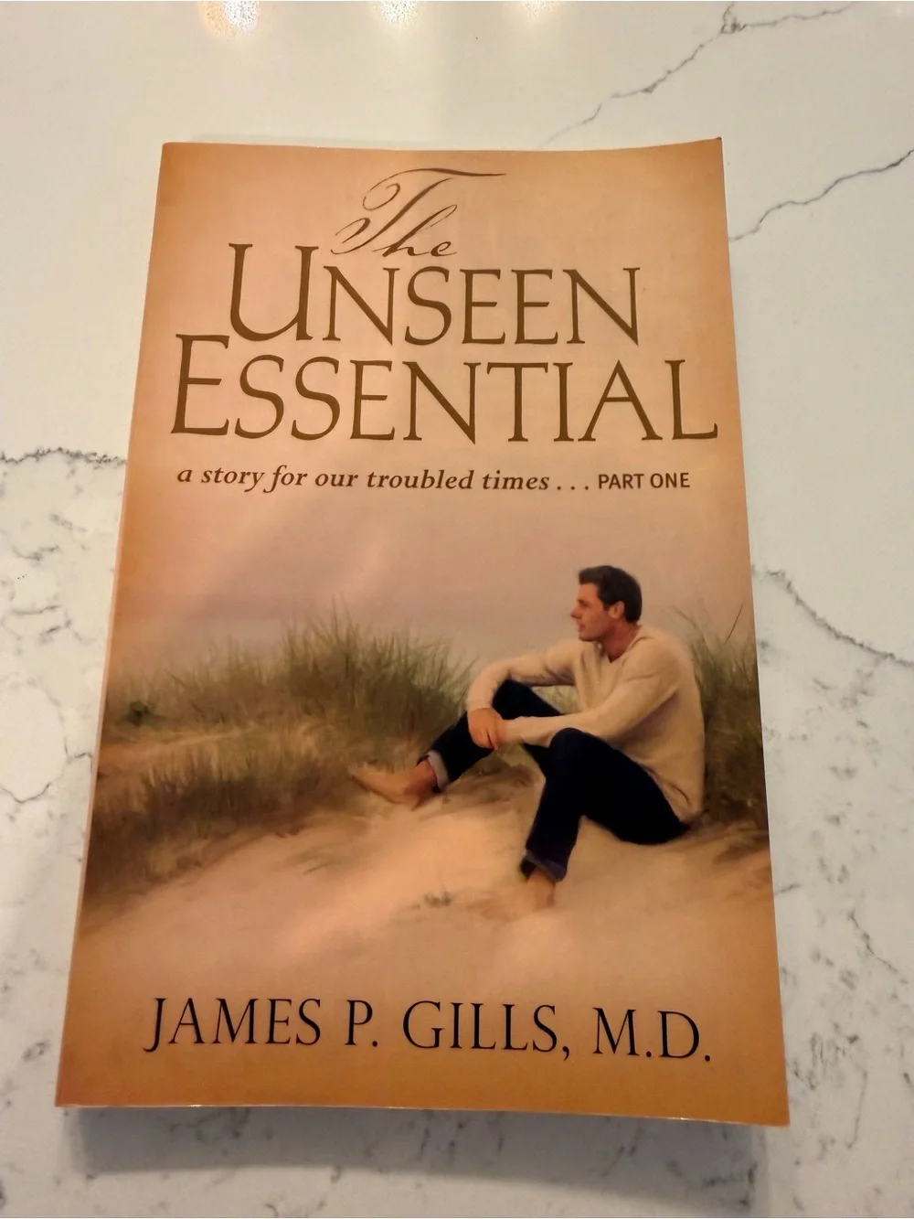 The Unseen Essential by James P. Gills, M.D. — Beige Cover